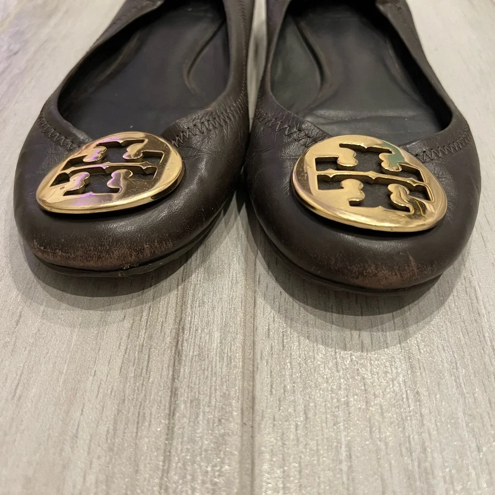 Tory Burch dark brown ballet flats with gold accent